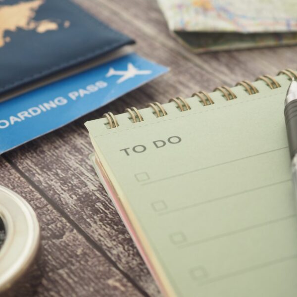 Travel preparation with boarding pass and checklist
