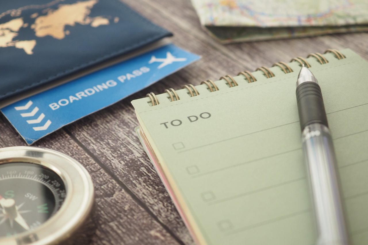 Travel preparation with boarding pass and checklist