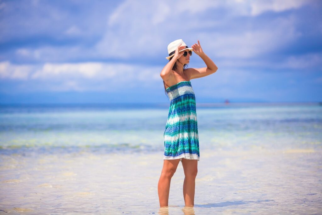 beautiful woman enjoying holiday on the beach